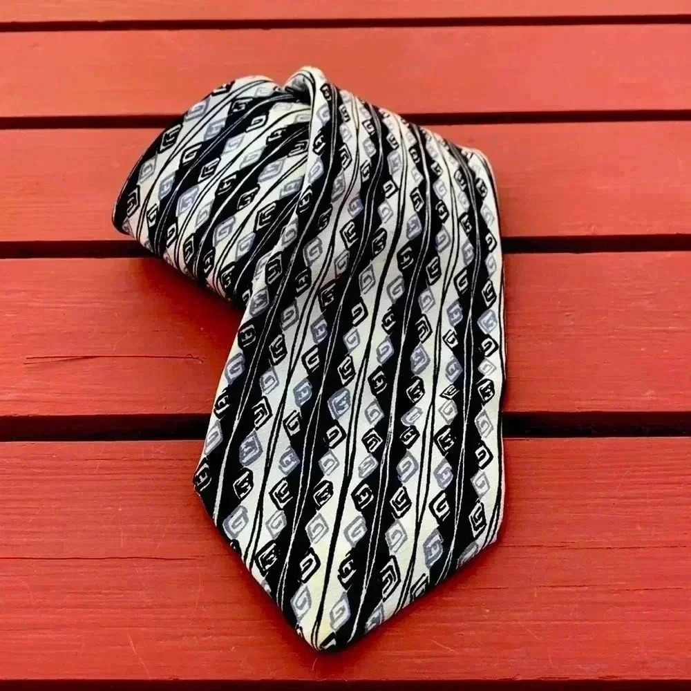 Tino Cosma lovely, 100% silk, Italian made tie in black, white and  gray